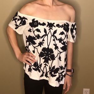 Sleeveless black and white flower top